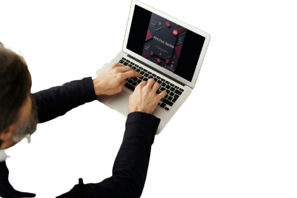 Person using a laptop with a white background